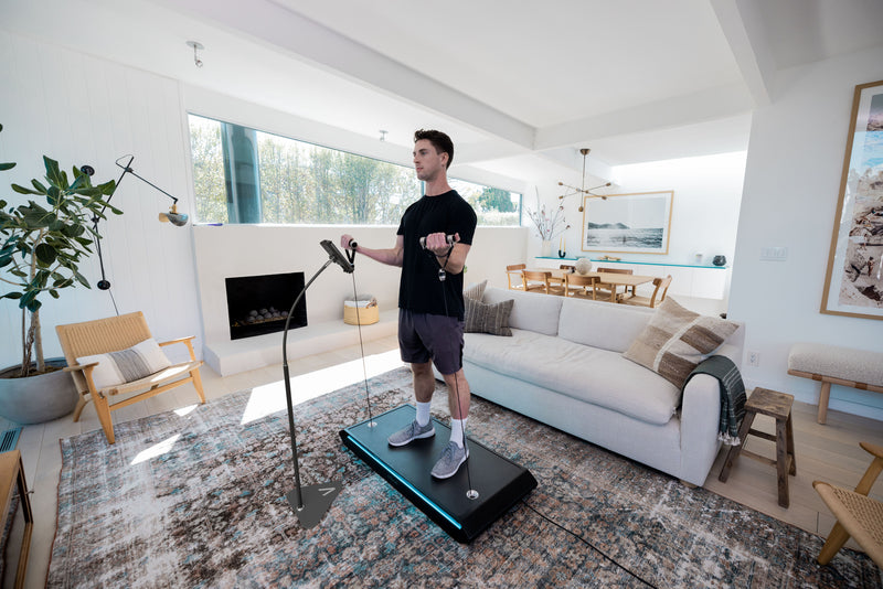 Experience the ultimate convenience with the Vitruvian Adjustable Phone Stand. This stand is the perfect solution for easy use of your V app during your workout, with an adjustable design that allows you to customize the viewing angle and height to your liking. 